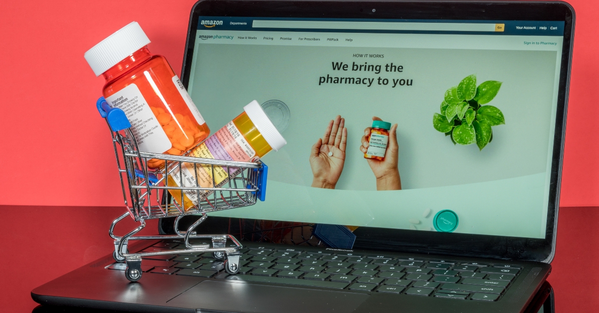 laptop and minature shopping cart
