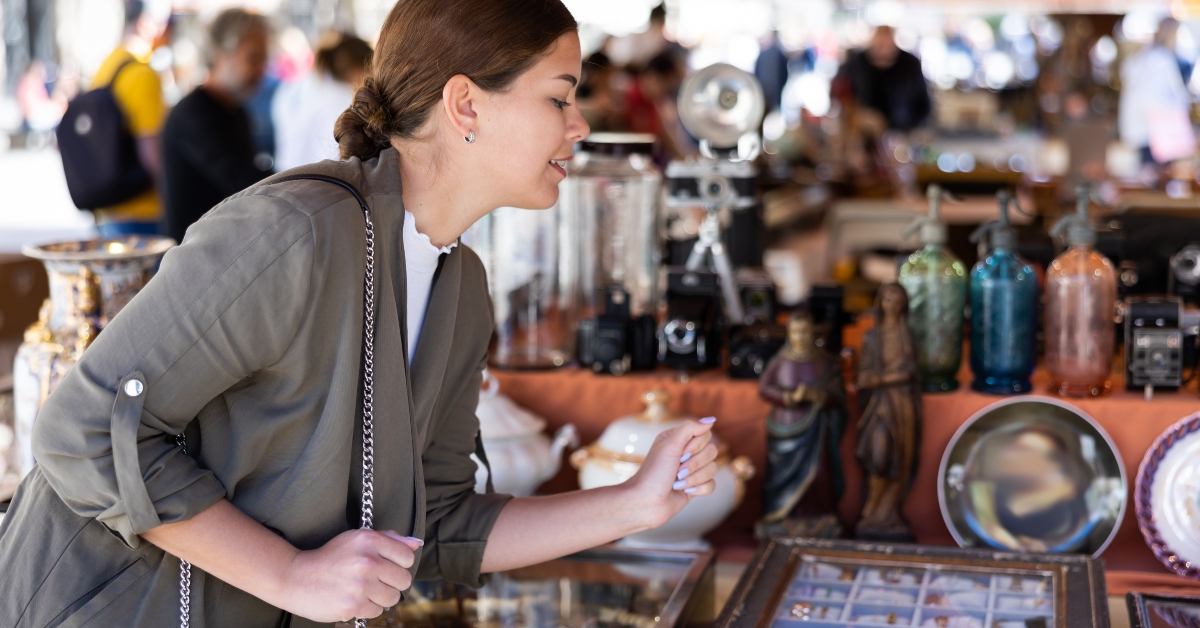 woman choosing interesting antique