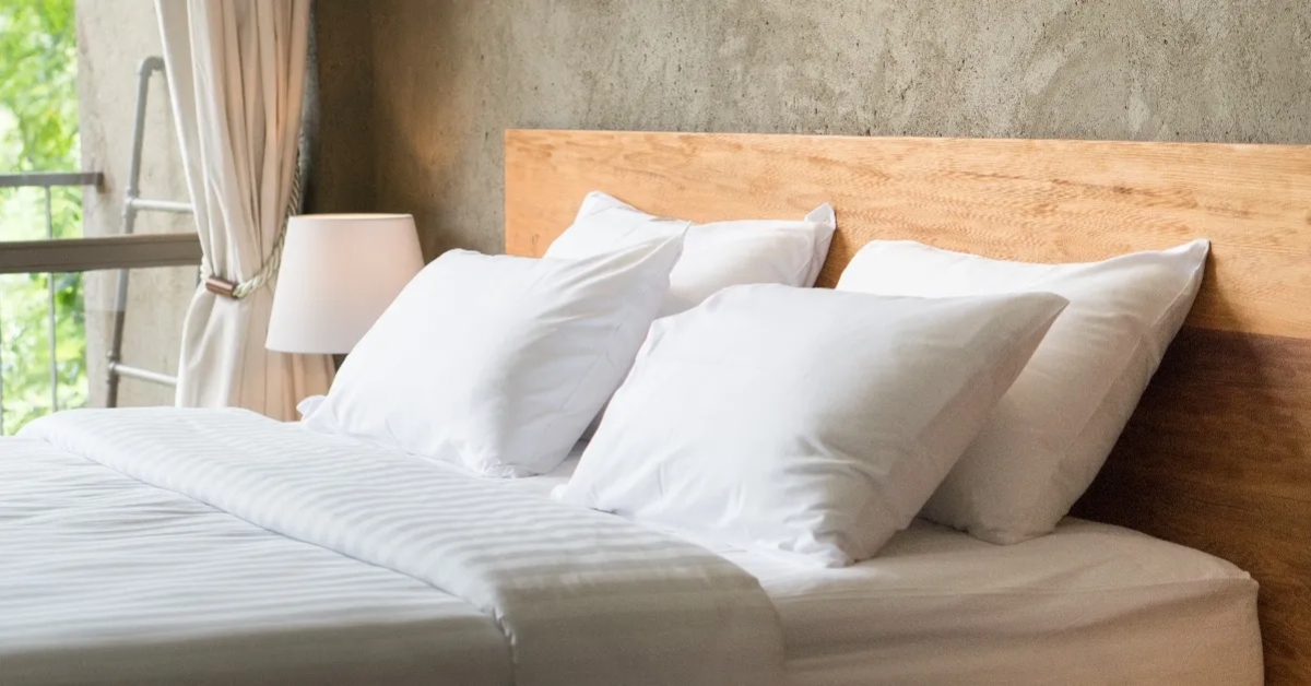 white pillows on the bed