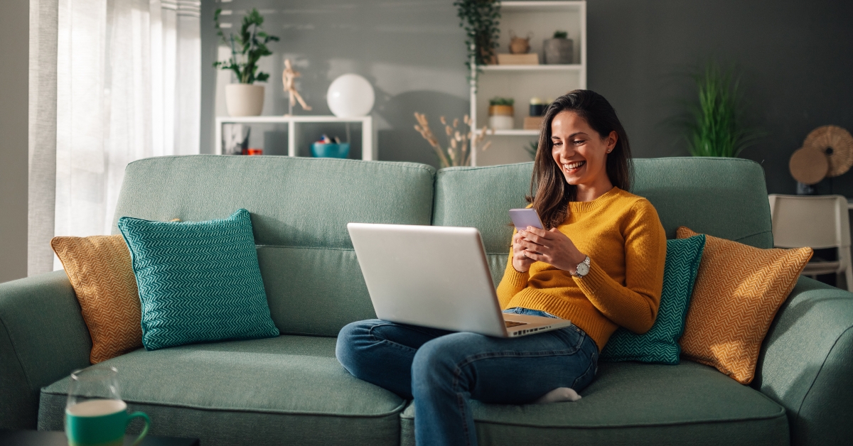 Woman typing on a phone