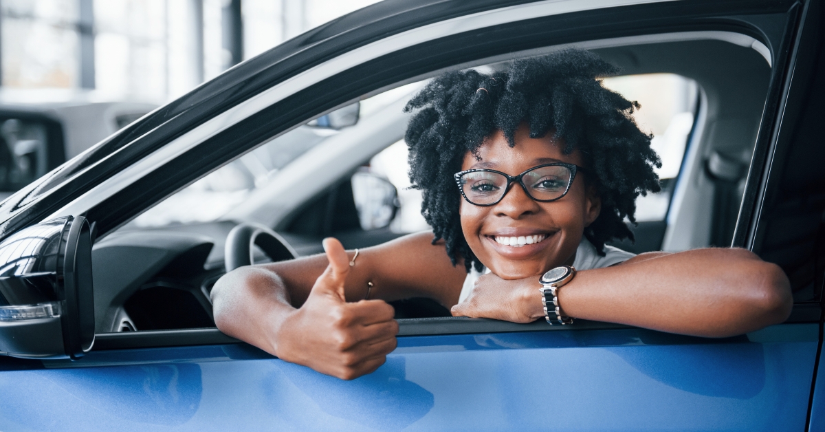 woman shows thumb up