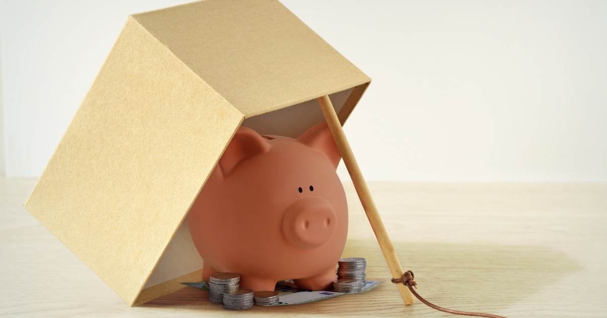 piggy bank in box trap