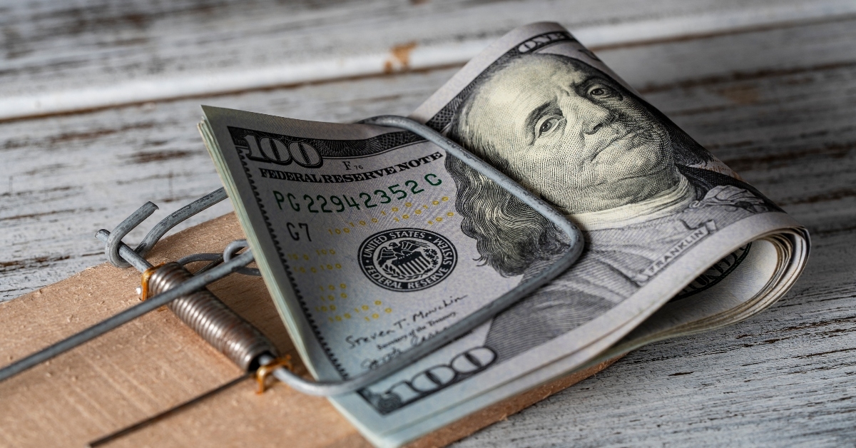 us 100 dollar bills in a mousetrap