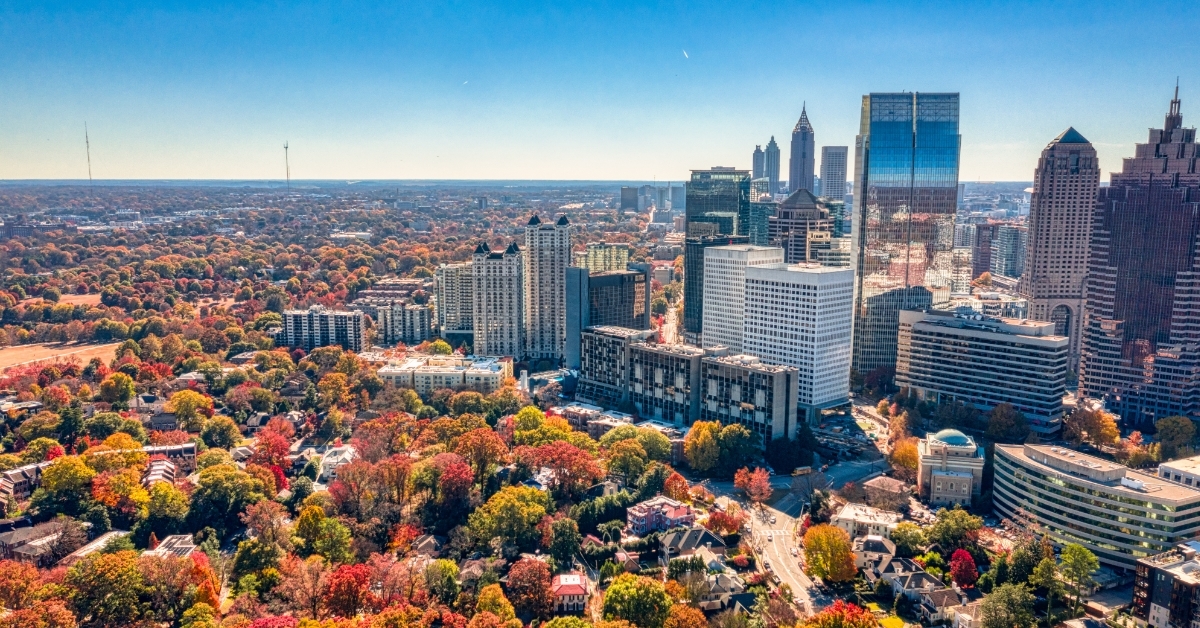 suburban houses and downtown Atlanta buildings