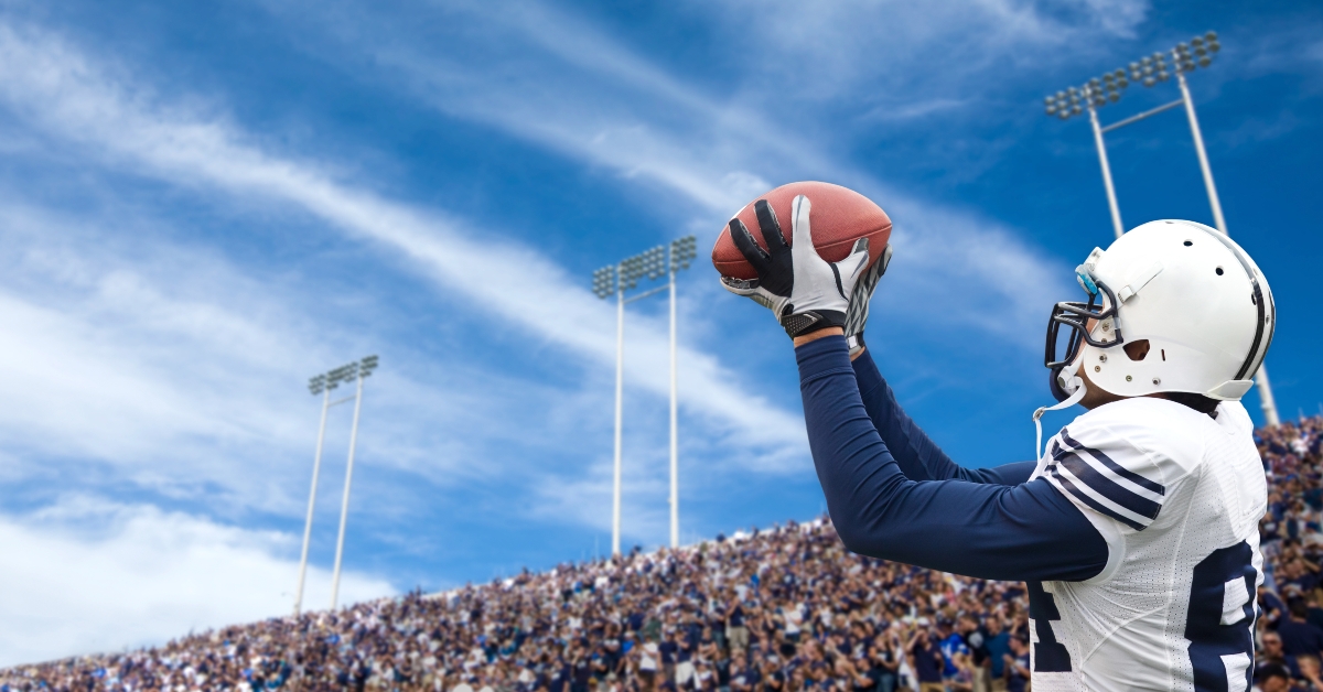 Football Player catching a pass