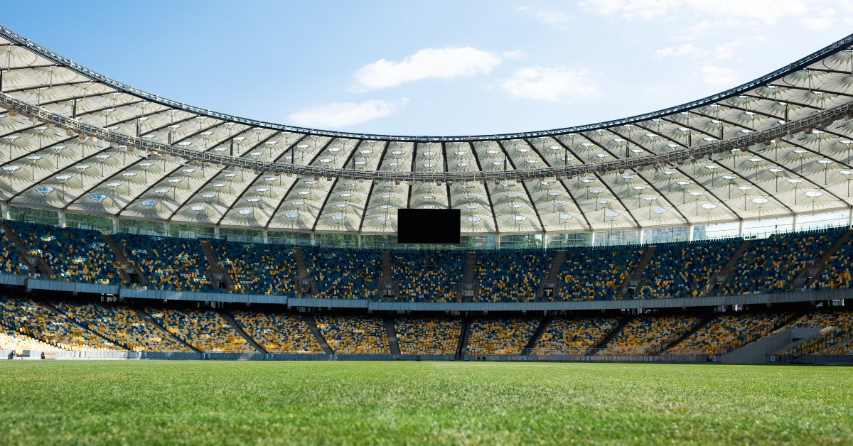 Grassy football pitch at stadium