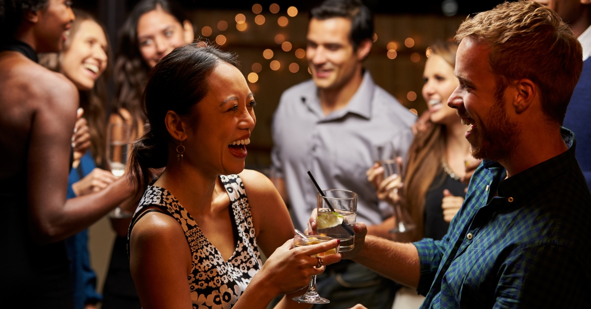 Couples Dancing And Drinking