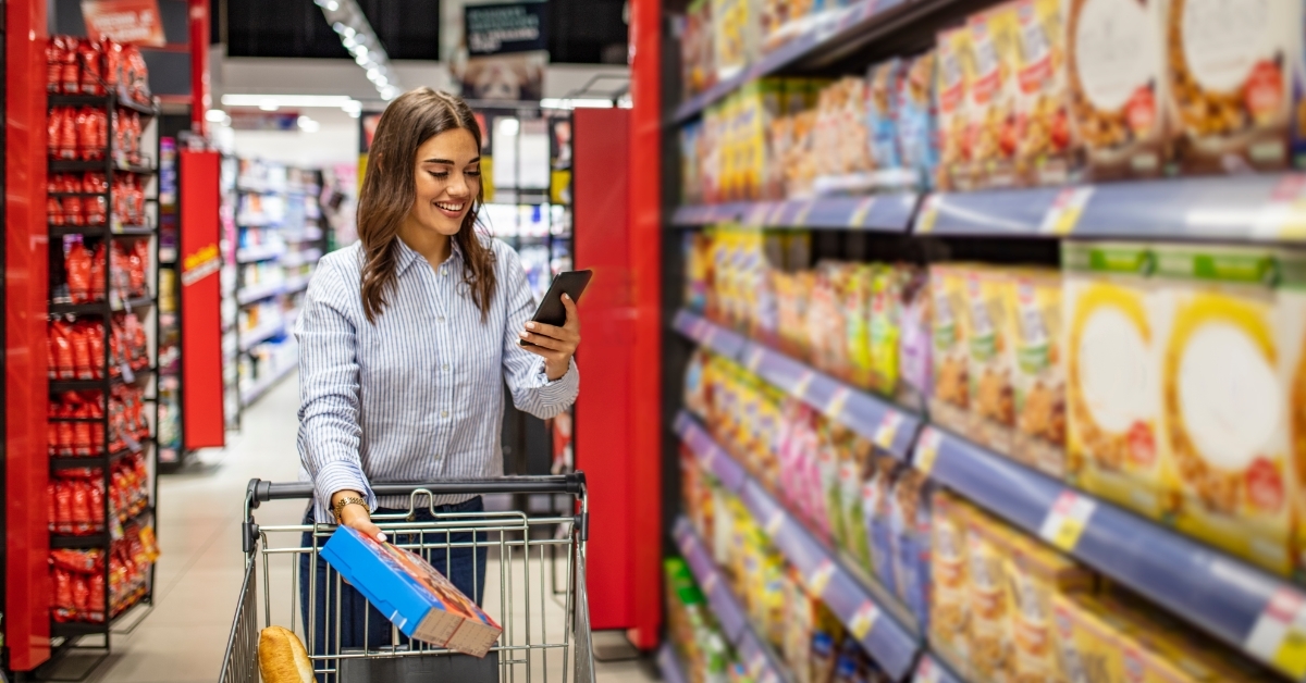 woman buying groceries in supermarket