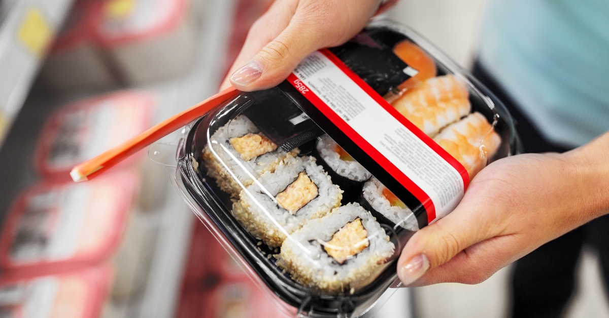 Hands with sushi pack