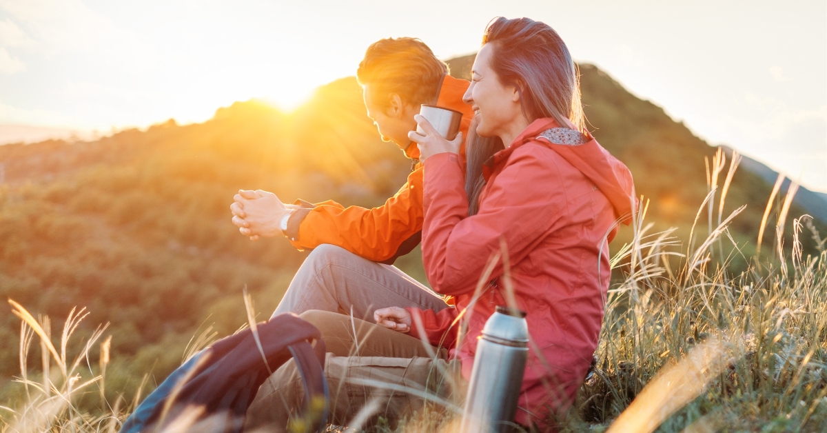couple resting in the mountains