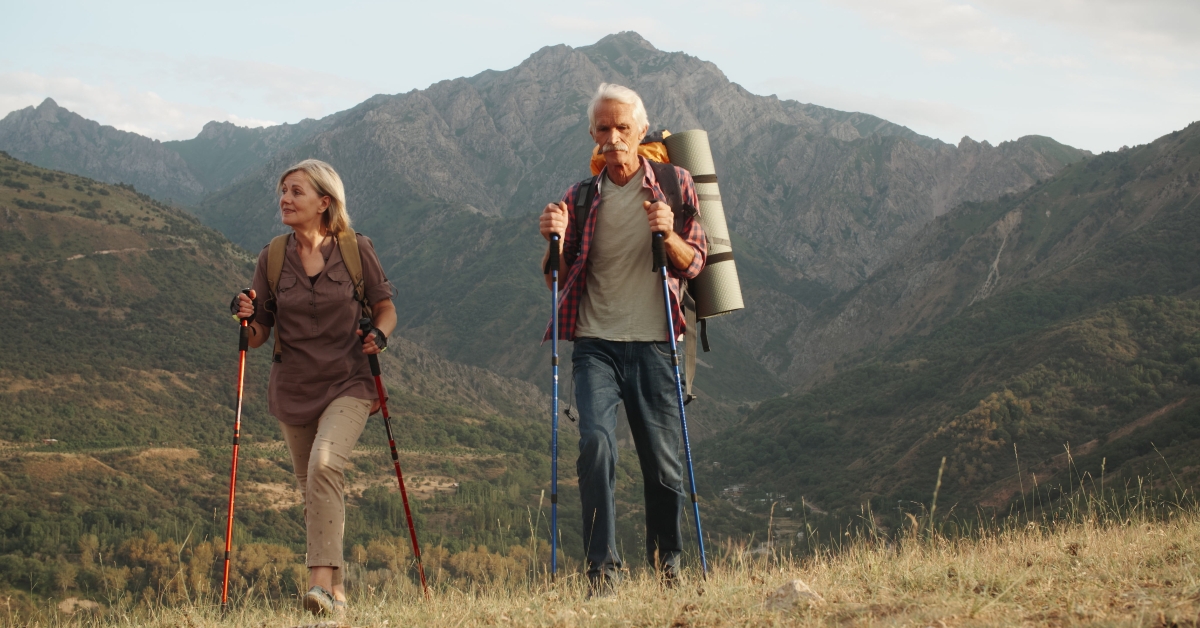 couple trekking in mountains