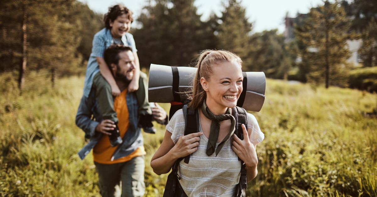  family hiking through the forest 