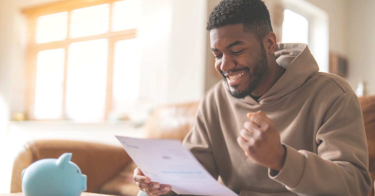 excited man reading job application