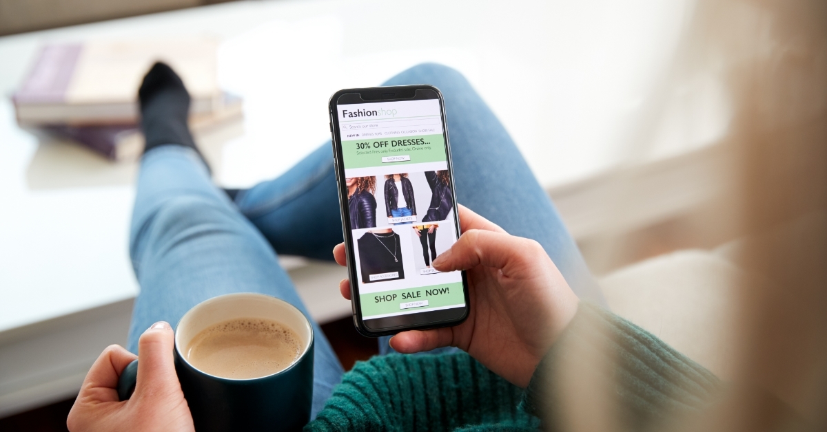 woman shopping on phone at home