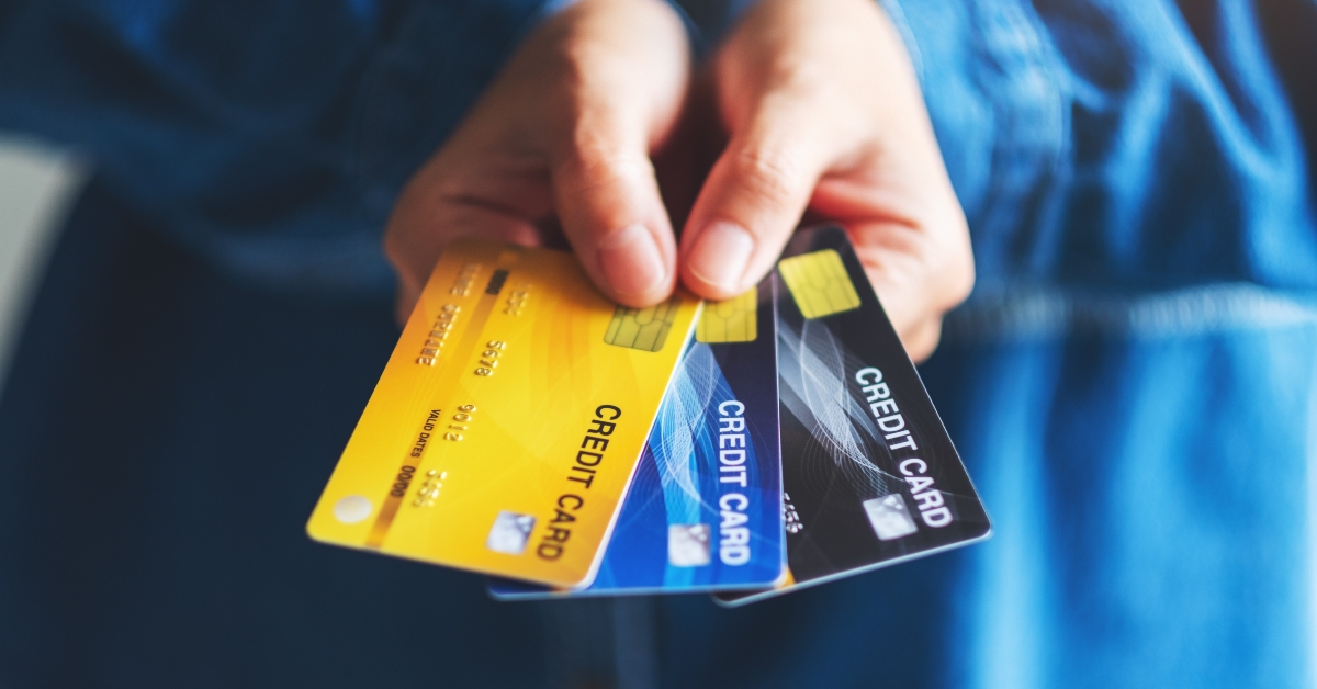 Woman showing credit cards