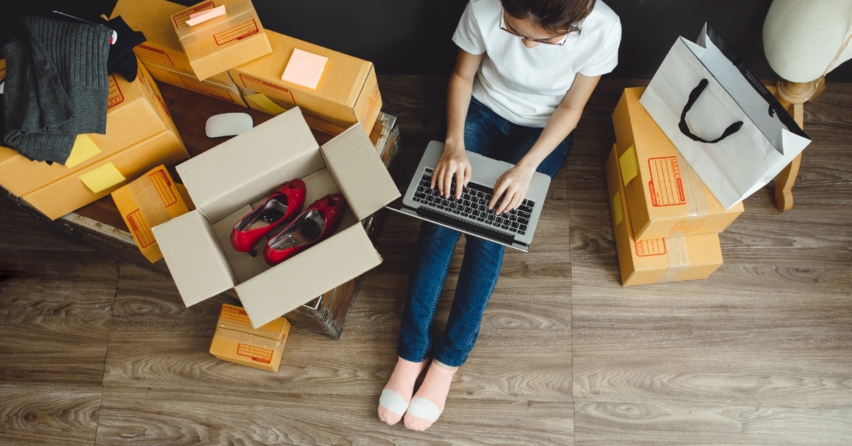 woman working from home shopping online