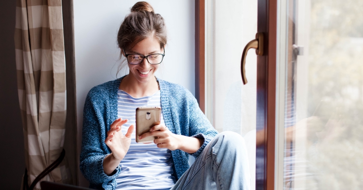 Young woman makes purchases in the Internet. 