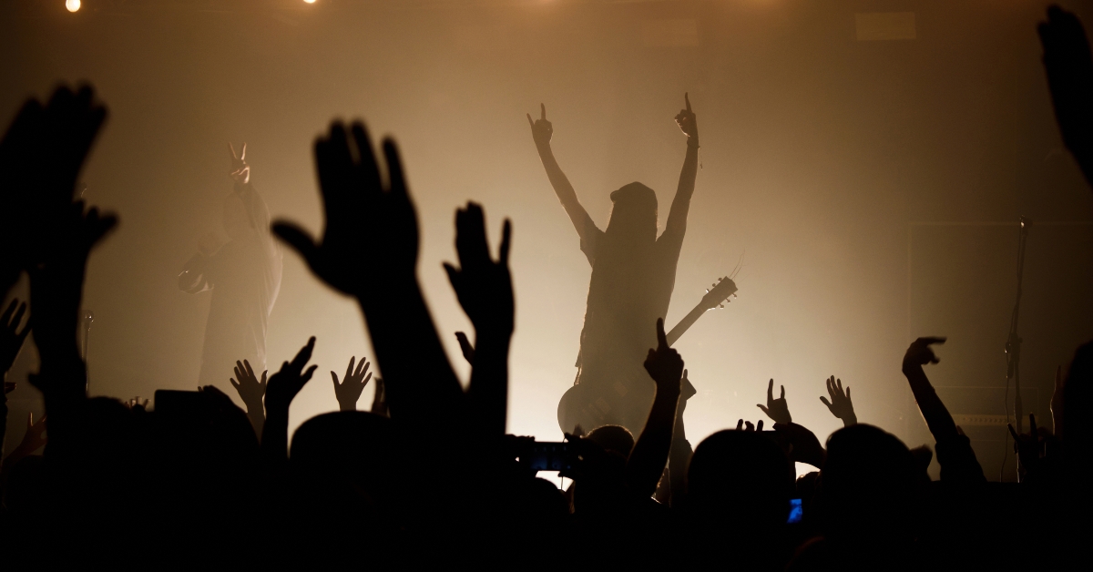lit silhouettes of musicians 