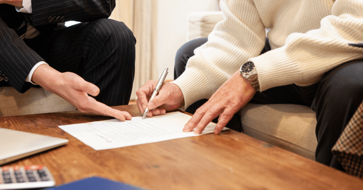 Senior man filling out paperwork
