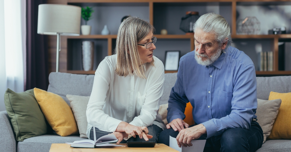 senior couple calculating finances 