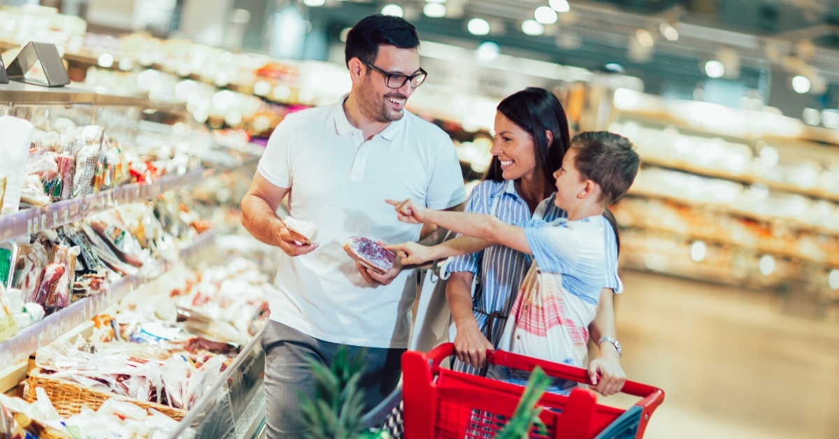 happy family doing grocery with child