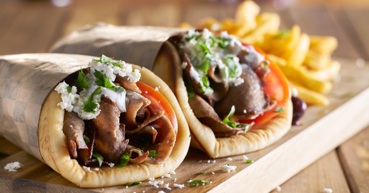 two greek gyros with shaved lamb 