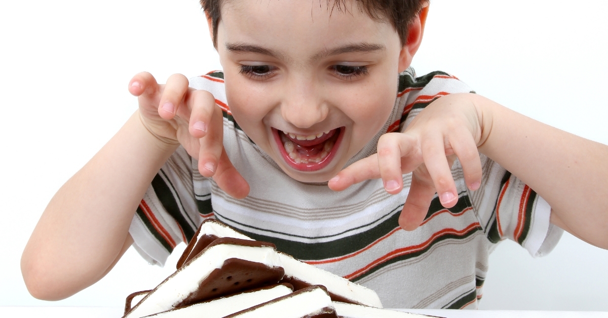 little boy excited at ice cream sandwiches