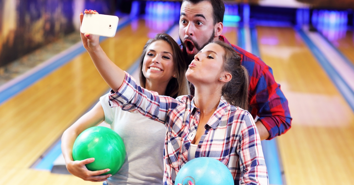 friends playing bowling