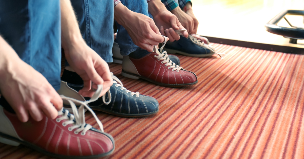 friends lacing their shoes
