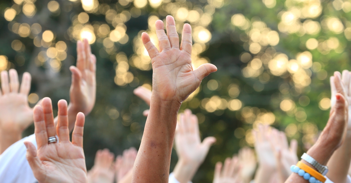 raising hands up for protest