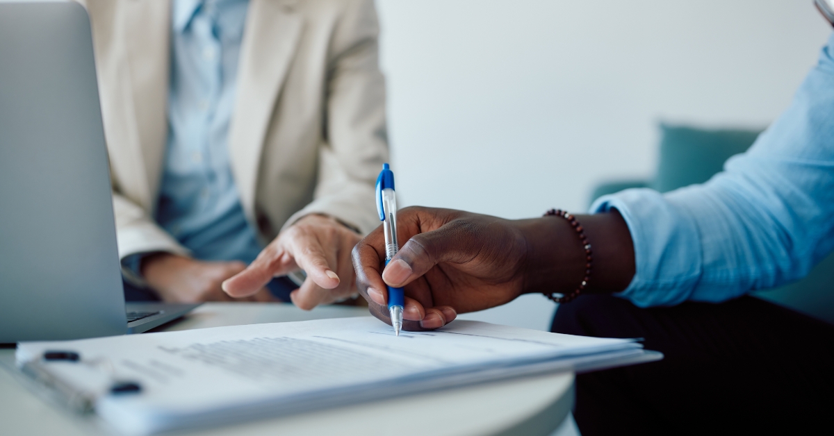 Signing contract with insurance agent