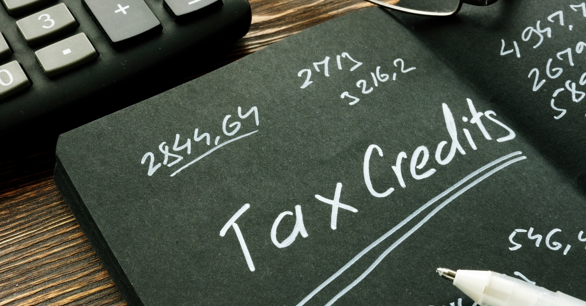 Tax credits inscription on black notebook