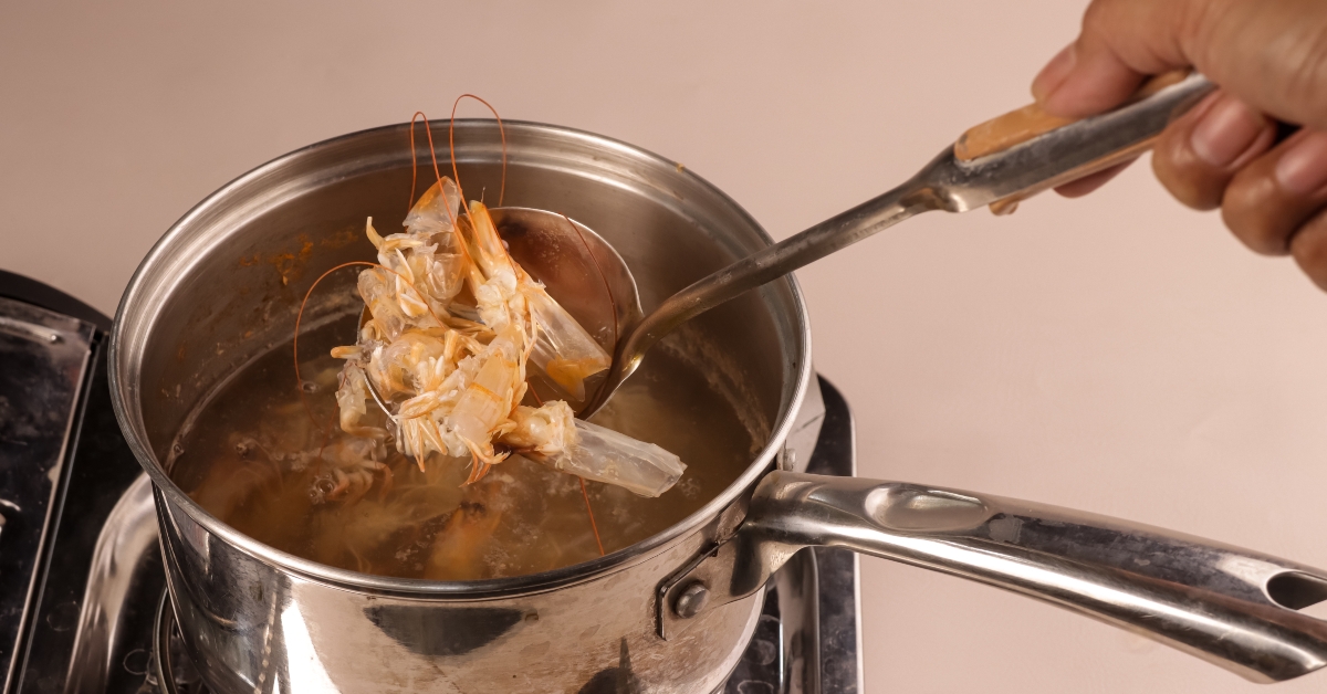 process of making stock from shrimp heads