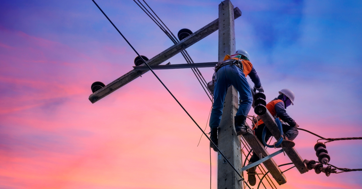 working on electric post