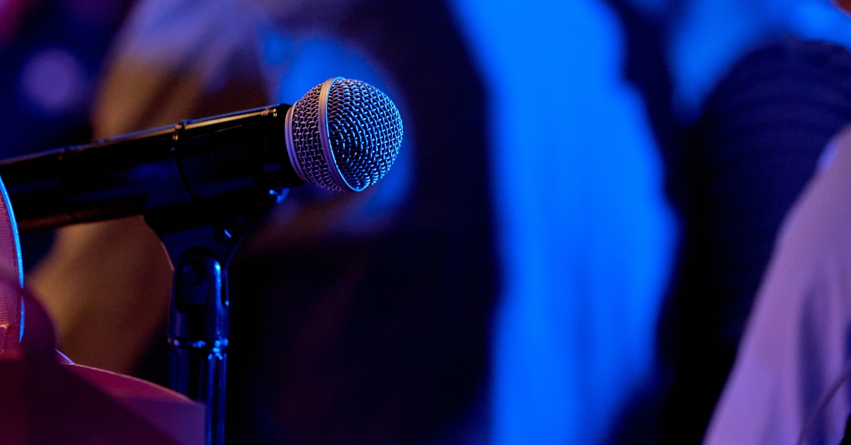 Modern microphone in karaoke club