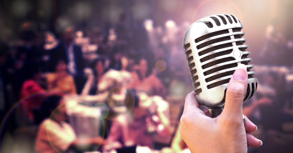 Retro microphone in women hand