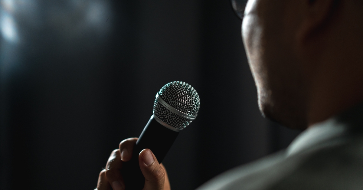 Speaker man talking on stage