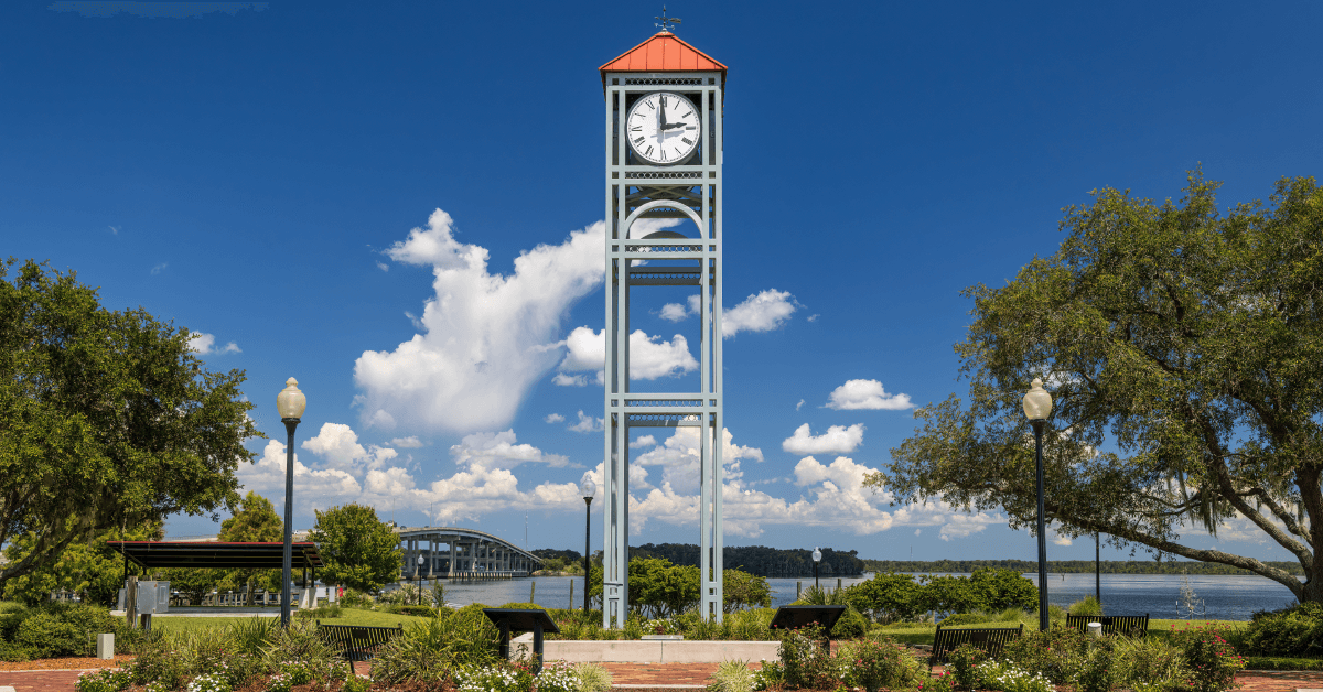 Photo of the clock tower at Riverfront Park in Palatka along the St John's River in Florida on a beautiful sunny day