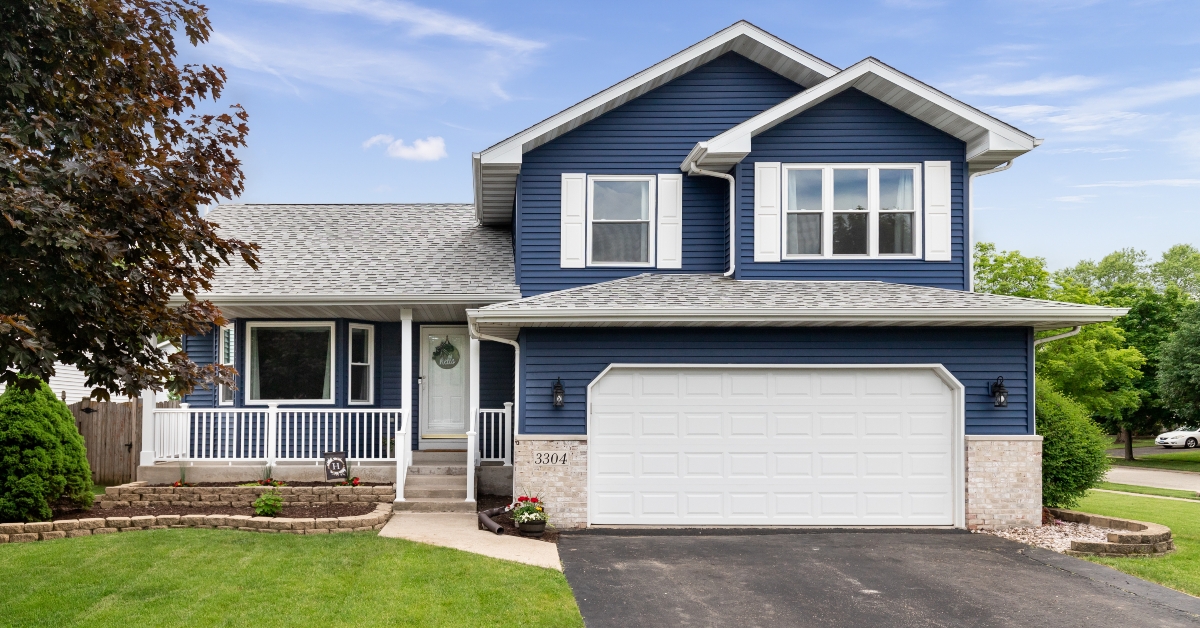 suburban home with blue siding