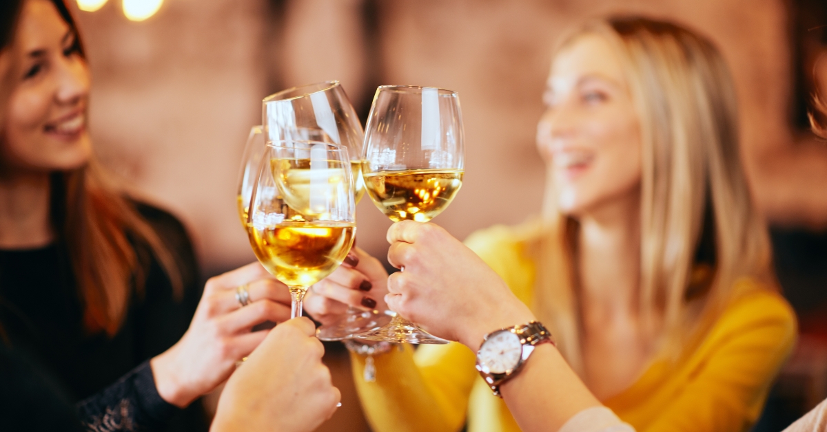 girlfriends drinking wine