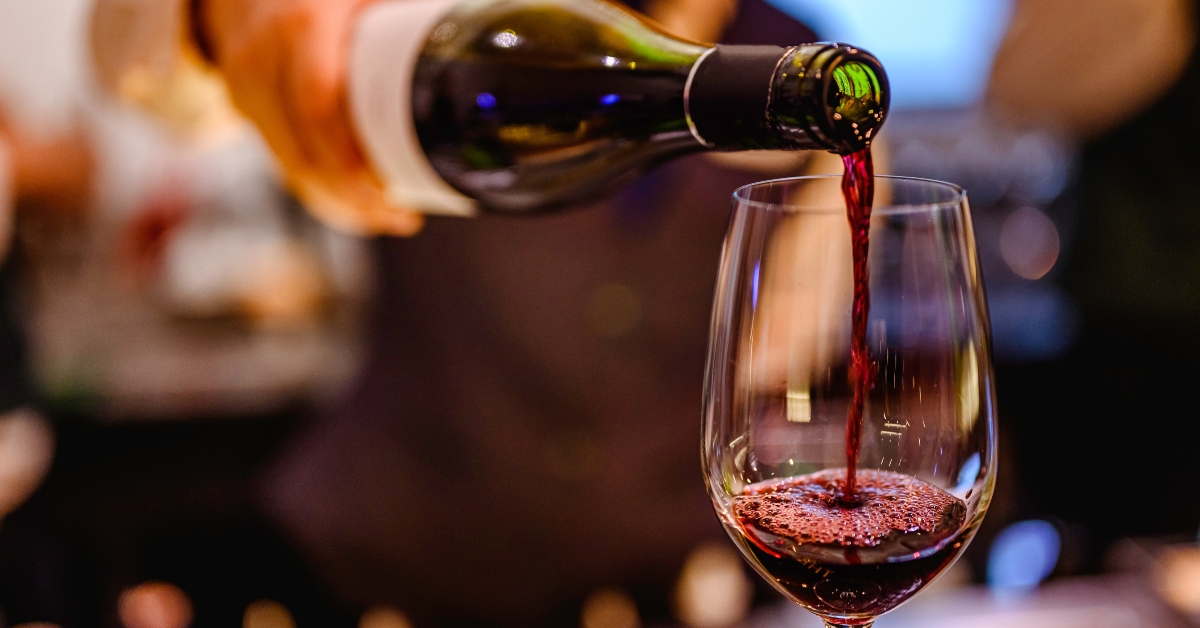 pouring glass of red wine