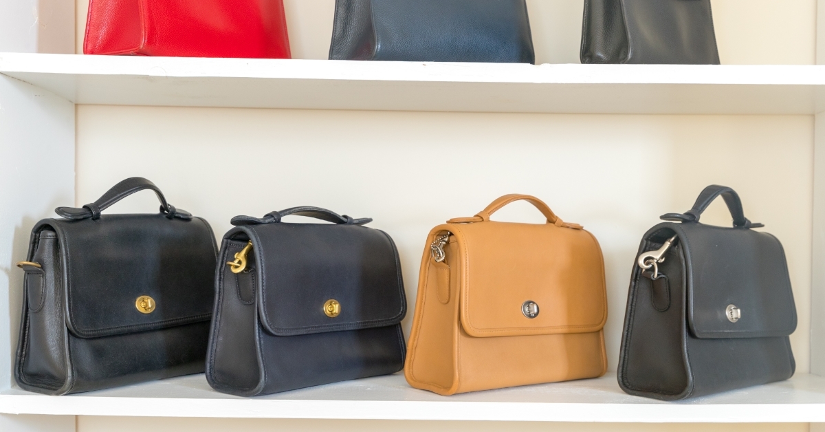 Vintage bags for sale on white shelf