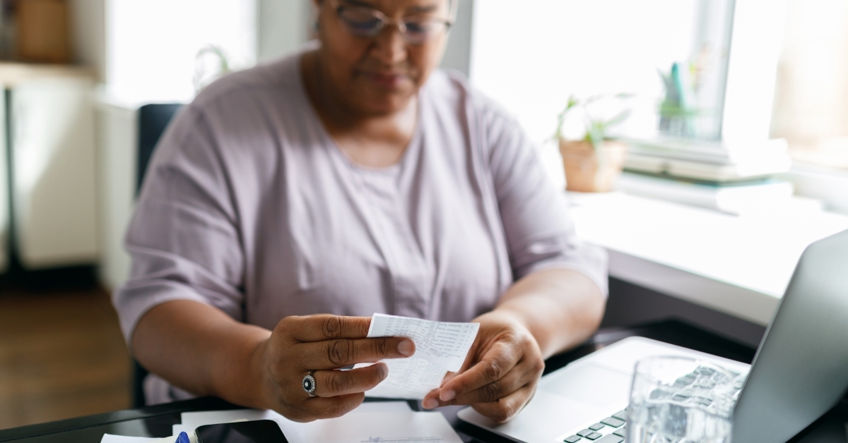 woman reviewing utility bills