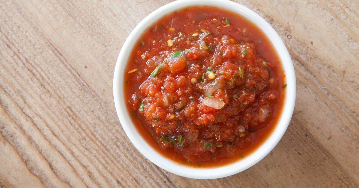Salsa bowl on wooden table