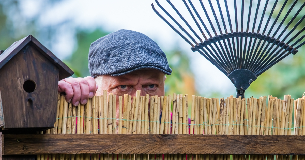 aggressive man watches his neighborhood