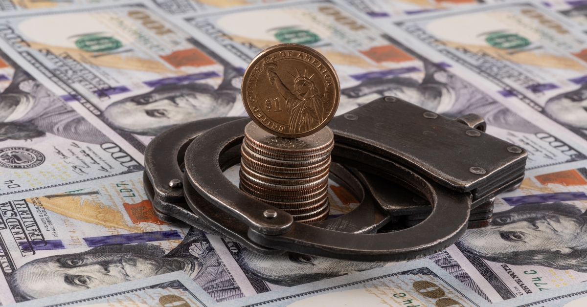Handcuffs and American coins