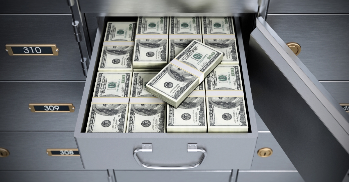 Deposit box full of dollar bills