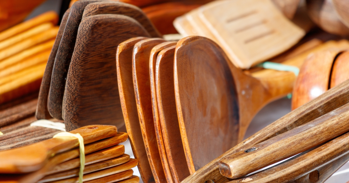 A collection of wooden spoons and spatulas