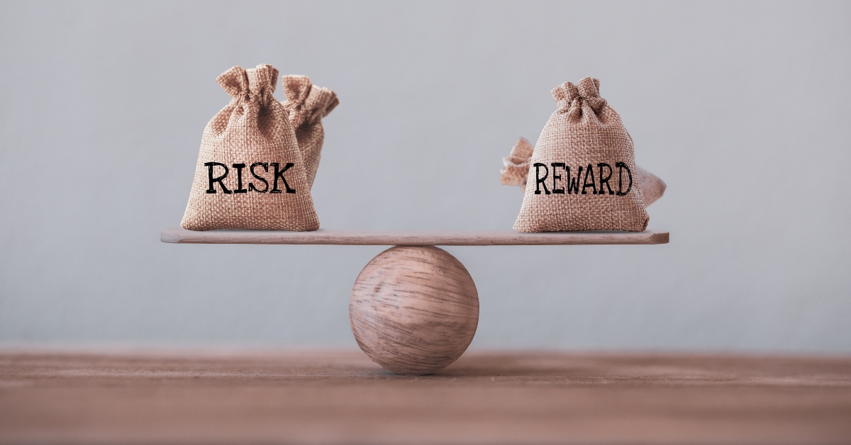Risk and reward bags on a basic balance scale