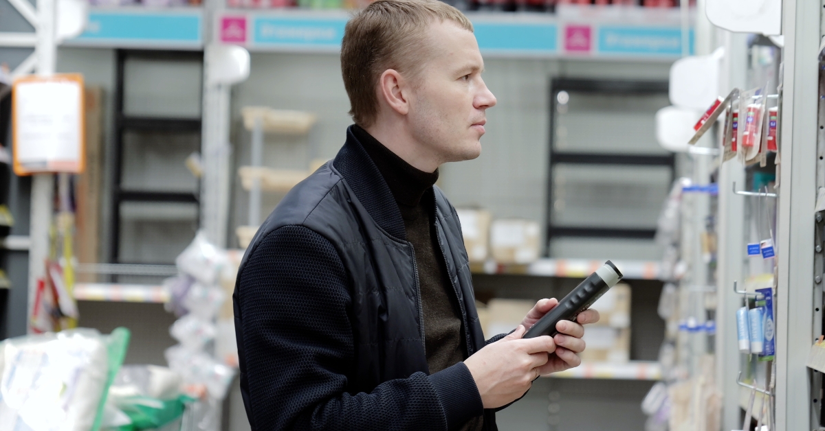 man chooses hygiene products
